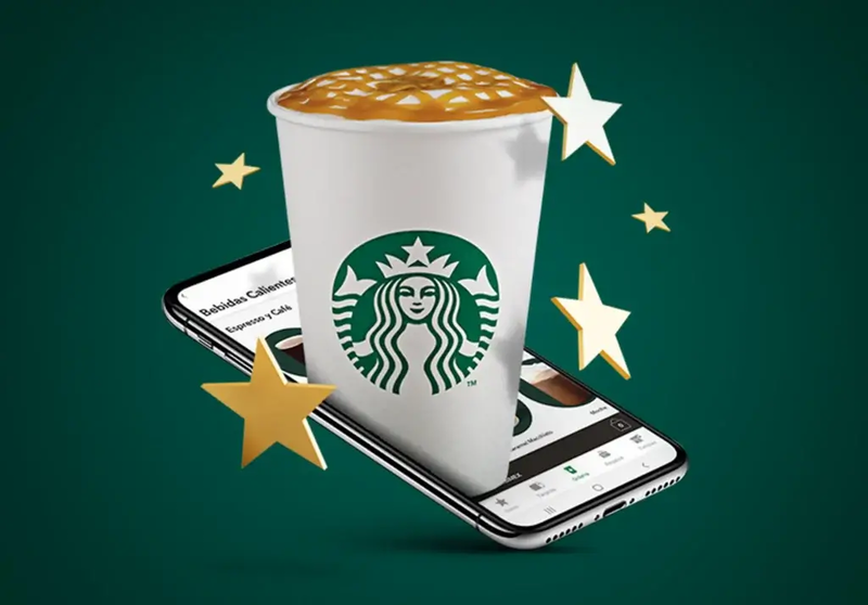 Kaffeebecher auf einem Smartphone