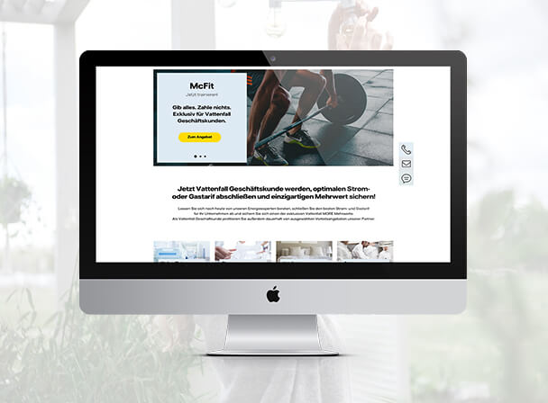 All-in-One Desktop-Monitor zeigt moderne Website im hellen Homeoffice